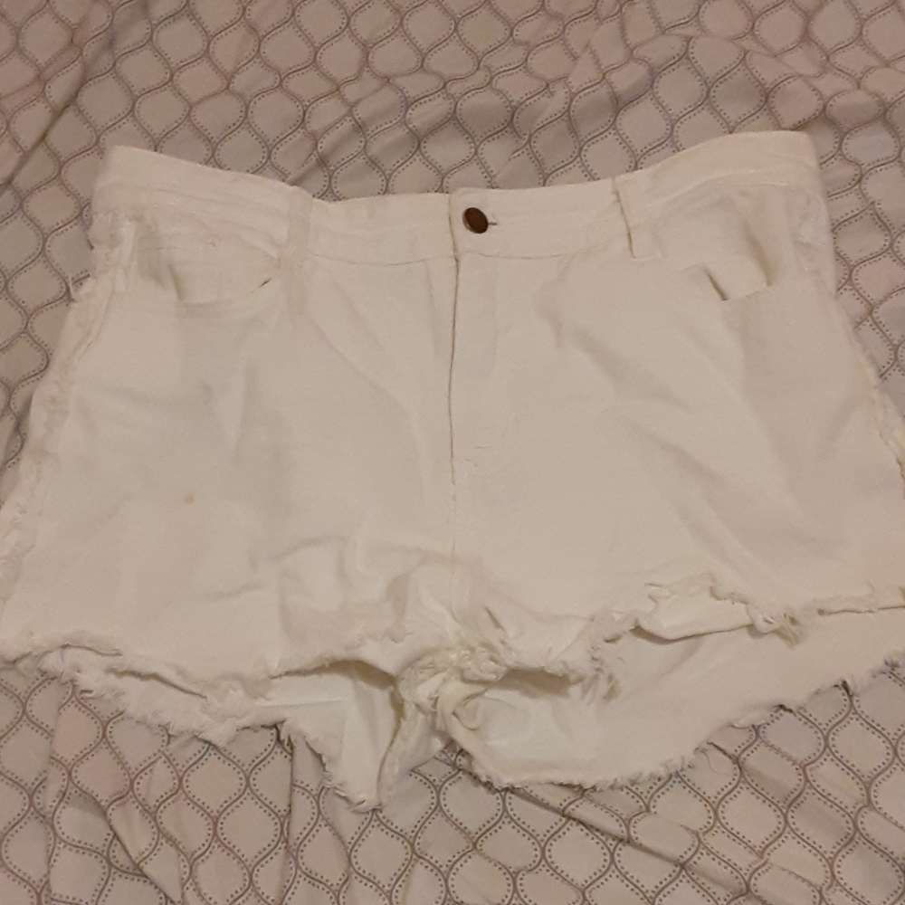 White ripped shorts!